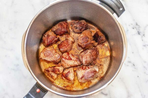 Lamb with Vegetables - photo of lamb stew meat in pressure cooker