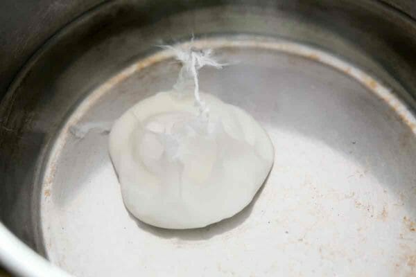 poach egg for four minutes in hot water