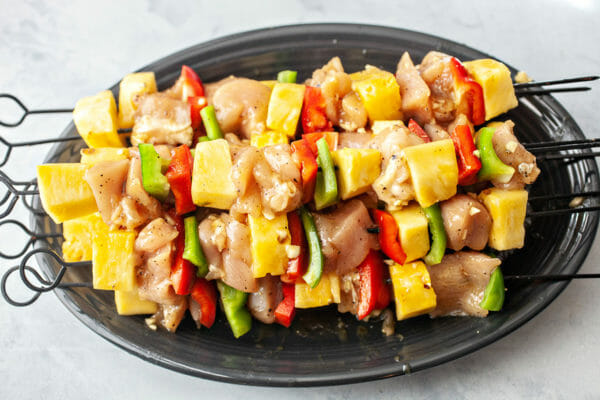 Grilled Chicken Kababs prep the skewers