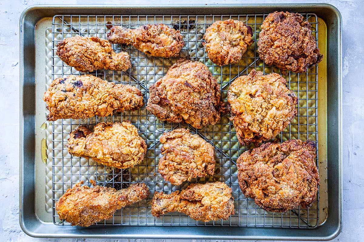 Fried sweet tea chicken transfer fried chicken to baking sheet