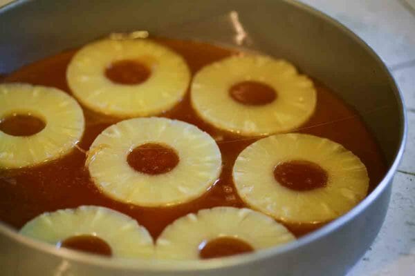 How to Make Pineapple Upside Down Cake - Adding the pineapple rings