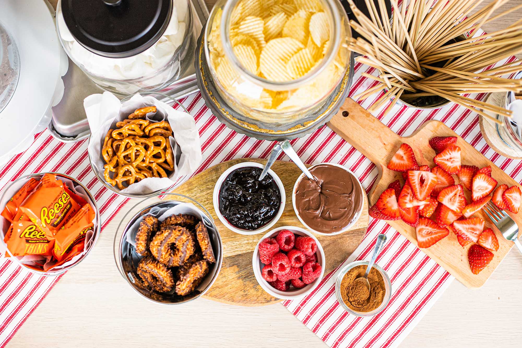 Overhead view of table of ingredients for backyard Smores Party.