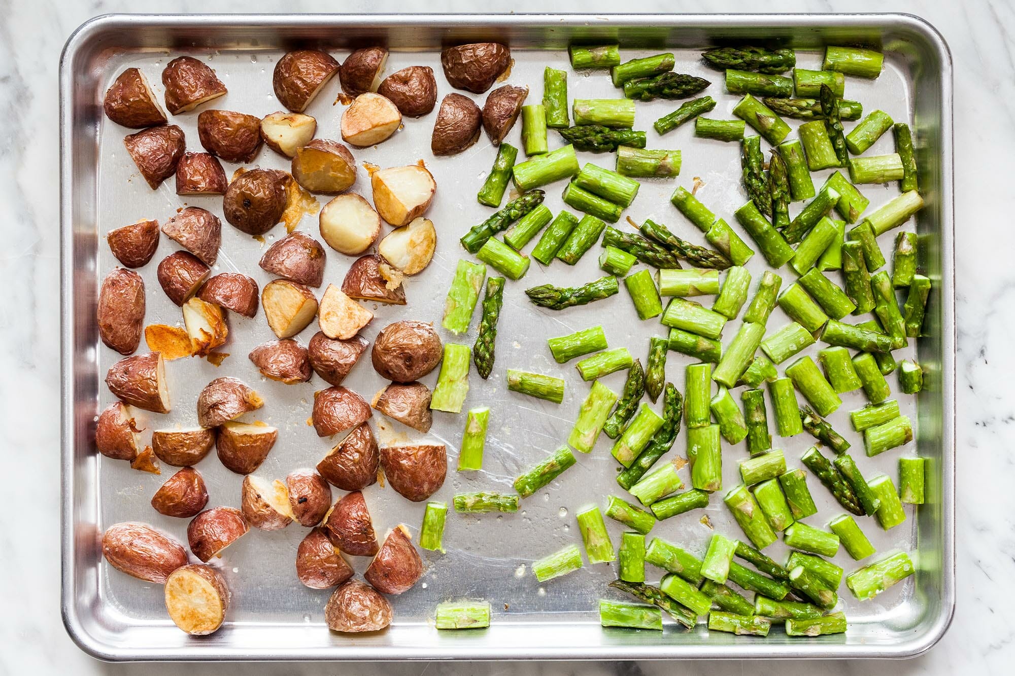 https://millersfoodmarket.com/wp-content/uploads/2020/12/Roast-Potatoes-Asparagus-METHOD-3-3.jpg