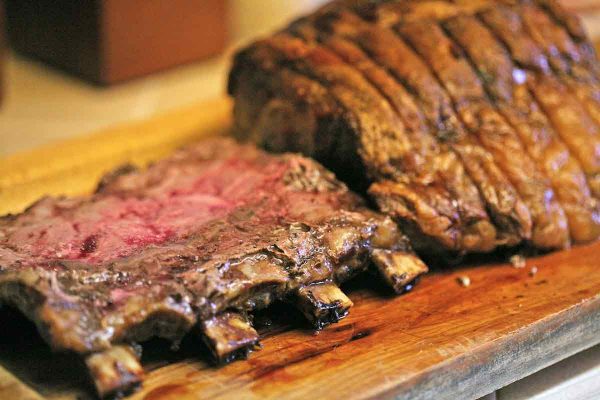 Removing the bones from the prime rib roast