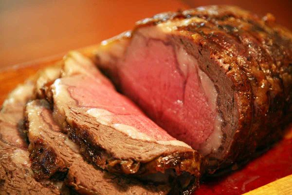 Slicing the prime rib into single servings